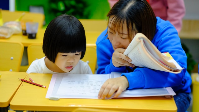 Behaviour interventionist with child